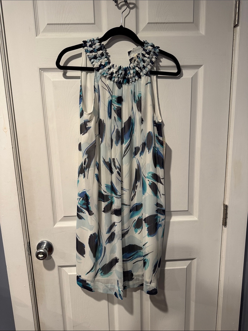 Sleeveless White Midi Dress with Blue and Gray Floral Print